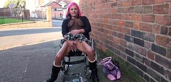 Redhead wheelchair bound babe Leah Caprice flashing and masturbating in public